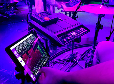 A tablet behind the drum shield running KLANG:app allows the drummer to fully control his own immersive IEM mix from within the cage