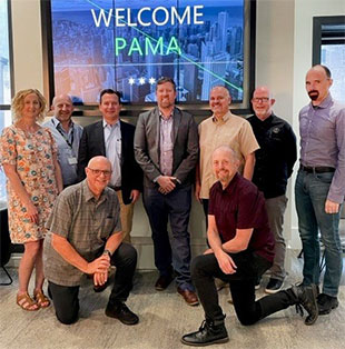 Members of the PAMA Board of Directors gathered in Chicago in 2022 at Shure’s downtown offices