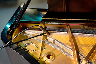 DPA 4099 Instrument Mic on one of two Steinway grand pianos (Pic: Dan Olybrych)