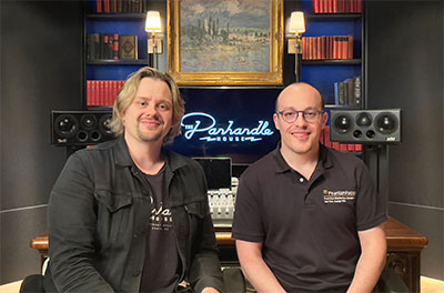 Erik Herbst and Lead PhantomFocus Installation Engineer Adam David Smith in front of the PFM HD-1000 Master Reference Monitor System in the Studio B mix room