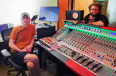 Sound Techniques' Danny White during the console installation with Boulevard owner Clay Blair