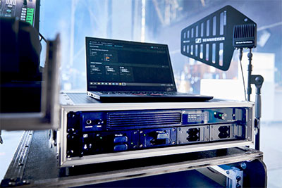 Below the Spectera Base Station is an L 6000 charging station with charging modules for the BA 70 rechargeable battery pack. Spectera uses the same batteries as Evolution Wireless Digital