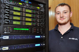 AVI-SPL’s Phil Marlowe with the Shure rack AVI-SPL’s Phil Marlowe with the Shure rack