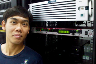 ENI Media's Tan Kim Kee with Junger Audio processor ENI Media's Tan Kim Kee