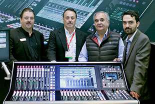 SSL's George-Horton and Audio-Acustica staff with the Live console Audio-Acustica
