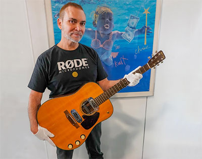 Røde founder Peter Freedman with Kurt Cobain’s 1959 Martin D-18E acoustic guitar