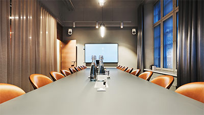 Conference room at Miltton House, featuring loudspeaker solutions from Genelec 