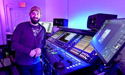 Church Production Coordinator Jon Wygant with the new DiGiCo Quantum338 mixing console at the church’s iTech location