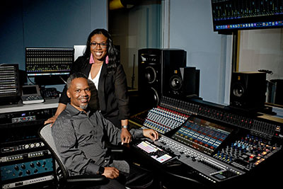 Robin and Mike Kinnie with their Neve Genesys Black console