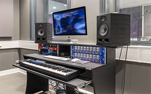 Workstation at Resonance Studio One, featuring Focusrite Red 16Line interface connected to two 8-channel Focusrite ISA 828 MkII preamps with Dante converter