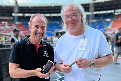 Martin Seidl, CEO of Austrian Audio, holding a OC18, with David Natale, FOH engineer for The Rolling Stones