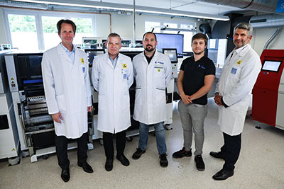 Andreas Hilmer, Lawo Chief Marketing Officer; Ronald Hennig, Lawo Head of Production; János Ács, Fuji Europe Corporation Assistant Service Manager; Michael Nahles, Fuji Europe Corporation Software Specialist; and Christian Lukić, Lawo Chief Supply Chain Officer