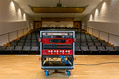 Recital Hall at University of Lethbridge, including a stagebox outfitted with a Focusrite RedNet 1 and other gear