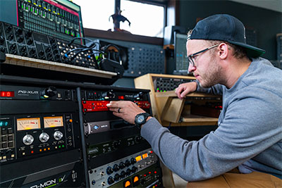 Ross Lara working on the Focusrite Red 8Pre at Archipelago Entertainment