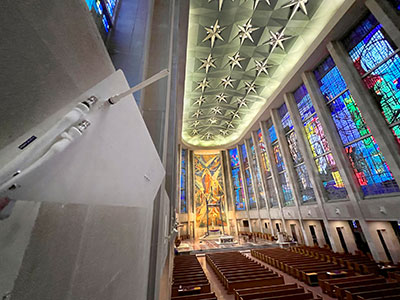 A single interior RF Venue Diversity Fin Antenna looks down the length of the spacious Cathedral of St. Joseph, providing true diversity reception and full room coverage