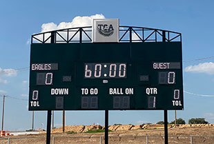 Integrated scoreboard and sound system