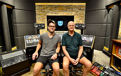 Studio owner Sammy Mitchell and studio designer Carl Tatz in front of the flagship PFM UHD-1000 Monitor System at Sammy's Black Cat PhantomFocus MixRoom studio