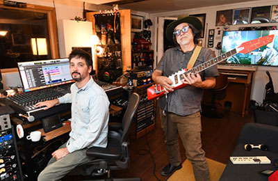 Tim O'Sullivan and former Beastie Boy Money Mark with Eastwood La Baye 2x4 Devo signature guitar (Pic: David Goggin)