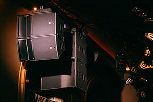 The main dance floor features two flown arrays of one A15 Wide and one A15 Focus with two KS21 subwoofers per side