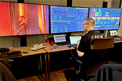 RF control center in the sound room: Spectera WebUI on the middle screen, the Sonoros app on the right-hand screen