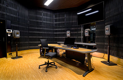 MUBA’s 5.1 surround setup featuring Genelec 8351B coaxial monitors for immersive learning in multichannel mixing