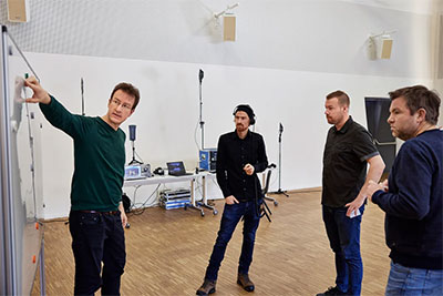 System designers Sebastian Georgi (l) and Jan Watermann (r) with Marco and Jonas
